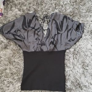 Bebe Black and silver cross cut blouse